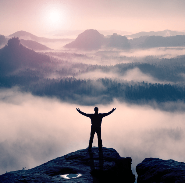 A person on top of a mountain